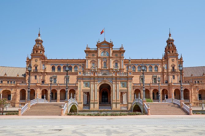4-Day Guided Tour Cordoba, Seville, Granada and Toledo from Madrid - Seville in half-day focus: Santa Cruz, Plaza de España, and Giralda views