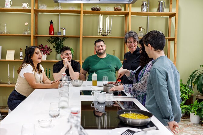 Authentic Tapas Cooking Class at a Private Local Eatery in Madrid - Eating together: wine, new friends, and why tapas is more than food