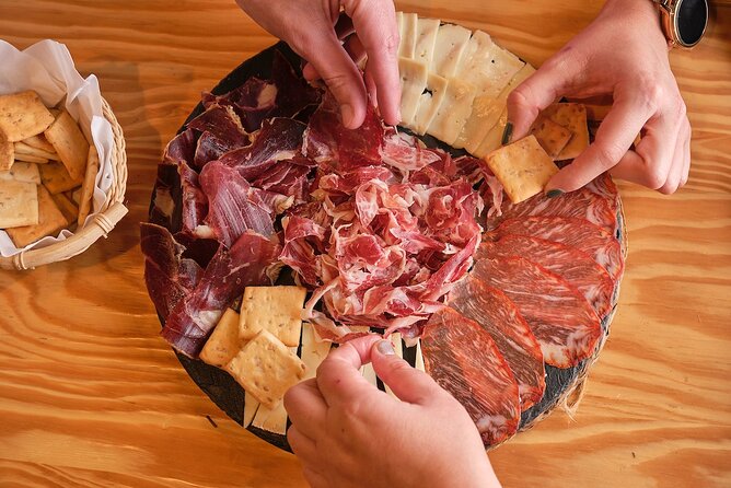 De Tapas in Malasaña: Evening Wine and Tapas Tour - Malasaña on Foot: From Napoleon-Era Fight to Movida Energy