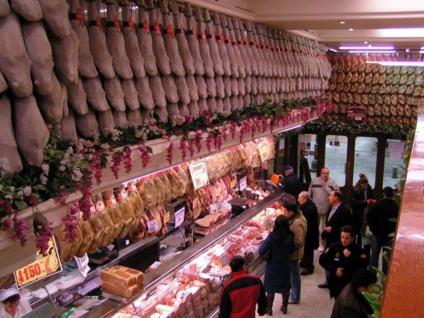Discover the best "Wines and Tapas in Madrid". - La Muralla on La Latina: Torrezno Iberico and a tapas-street setting