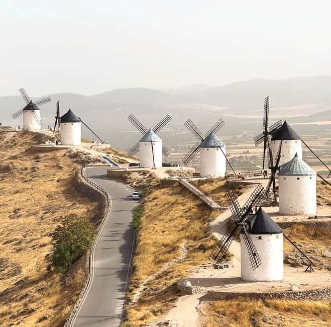 From Madrid: Toledo & Iconic Don Quixote Windmills Day Tour - The Toledo walking tour: medieval stories that help you read the streets