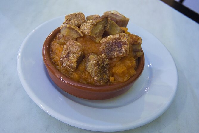 Gastronomic Tour: Discover the best “Wines and Tapas of Madrid” - La Latina flavor at Puerta de Moros: torrezno ibérico at La Muralla