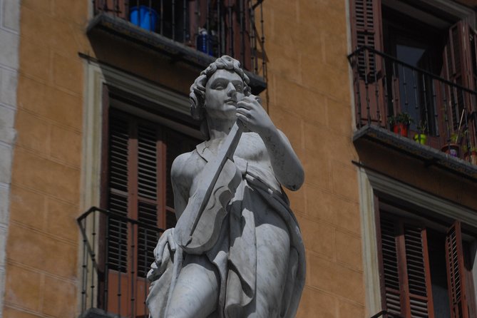 Half-Day Madrid History and Legends Private Walking Tour with Hotel Pick Up - Austrias neighborhood: old Madrid’s tight streets and big stories