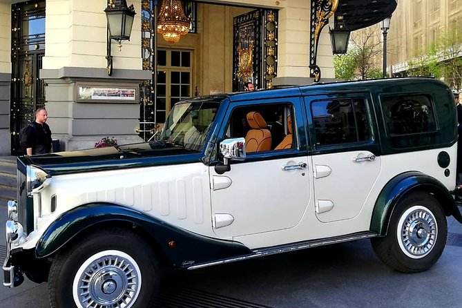 Historic and Modern Madrid by Classic Car Private Tour - Royal Palace exterior, Almudena Cathedral, and San Francisco el Grande
