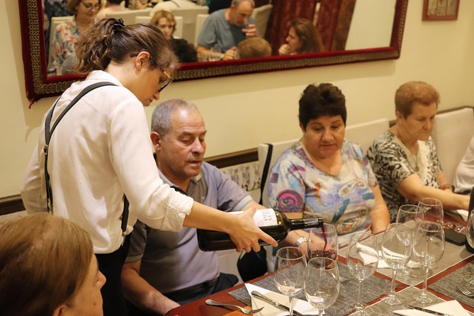 Iberian Ham and Wine Small Group Tour in Madrid - Wine pairing: four Spanish wines, taught as a skill