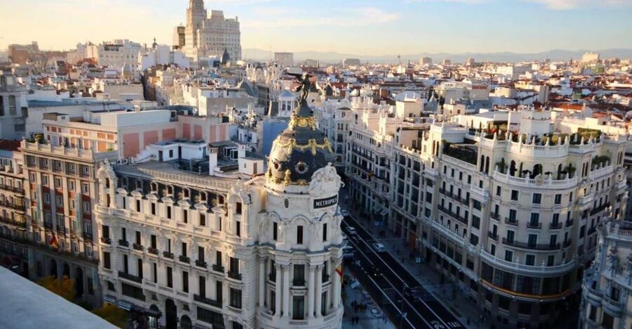 Madrid: 1.5-Hour City Highlights Guided Walking Tour - Puerta del Sol and Plaza Mayor: The Squares That Keep Madrid Moving