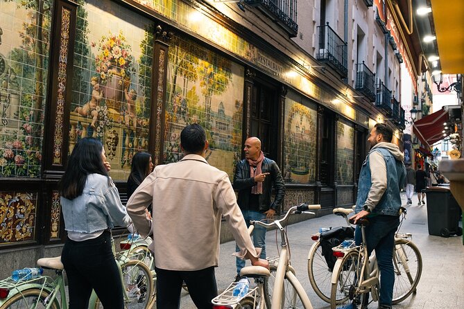 Madrid at Night: Vintage Bike Tour of City Highlights - Las Letras Quarter: the bohemian tone before the big avenues