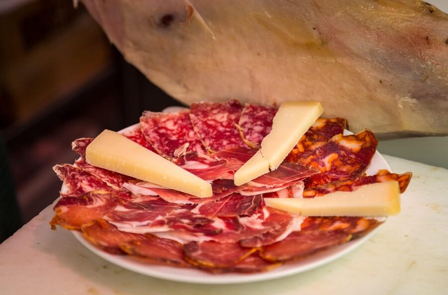 Madrid: Authentic Tapas Evening Tour with a side of History - Key highlights you’ll feel fast