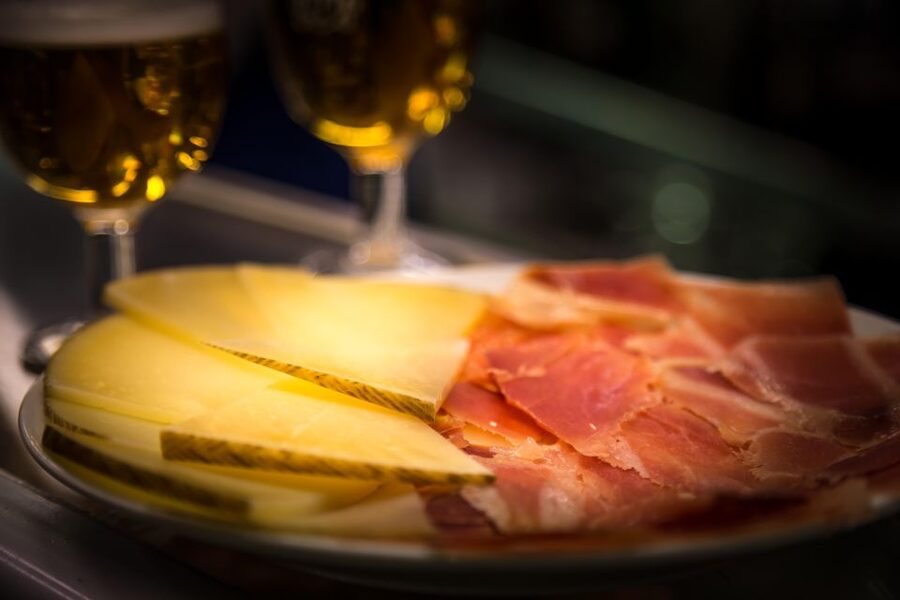 Madrid: Authentic Tapas Evening Tour with a side of History - Plaza Isabel II Meeting Point: Start Where Madrid Keeps Walking