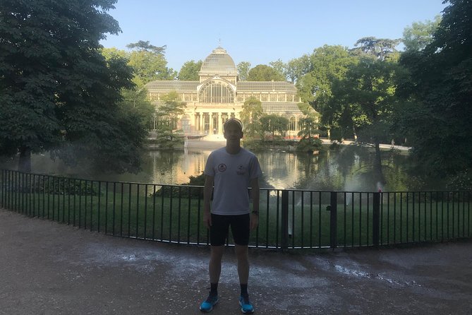 Madrid City Center and Retiro Park Running Private Tour - Plaza de Oriente and the Opera skyline on the move