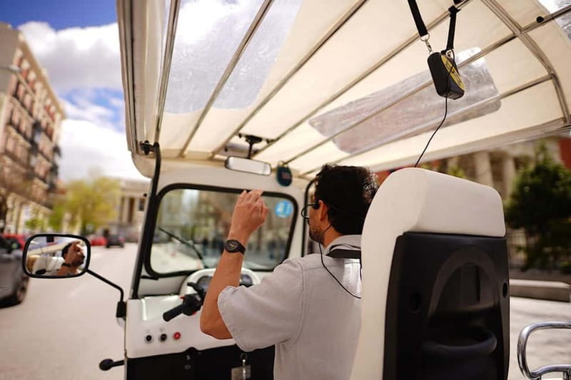 Madrid: Discover the City by Private Electric Tuk Tuk - Jerónimos and the big-sight contrast Madrid does so well
