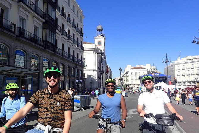 Madrid E-Bike Small Group Tour - Royal Palace area: scale, domes, and the story behind the site