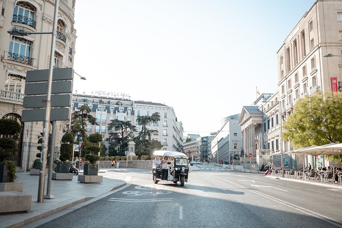 Madrid Expert Plus Tour with Local Guide in Eco Tuk Tuk Private - Neptune Fountain, Prado-area art focus, and San Jerónimo el Real