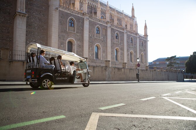 Madrid Expert Plus Tour with Local Guide in Eco Tuk Tuk Private - Puerta de Alcalá, Columbus Square, and the big plaza icons (Neoclassical to football)