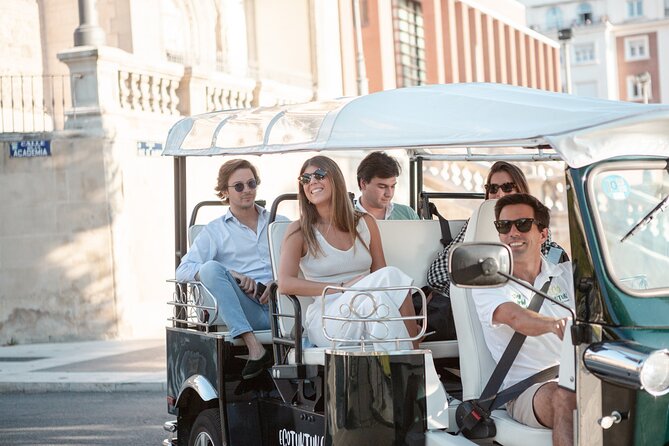 Madrid Expert Tour with Local Guide in Eco Tuk Tuk Private - San Jerónimo el Real and Puerta de Alcalá: religion, royalty, and grand entrances