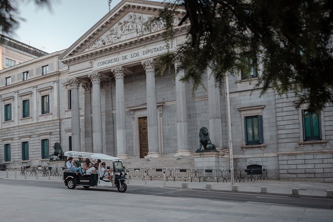Madrid Expert Tour with Local Guide in Eco Tuk Tuk Private - Columbus Square, the Gardens of Discovery, and the National Library