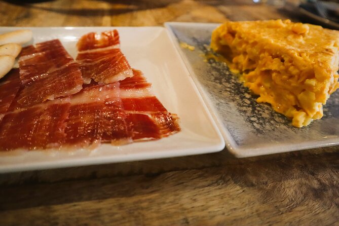 Madrid Food Tasting Tour of Hidden Gems (Small Groups) - Stop 3: Jamón Ibérico and Tortilla Madrileña in a Historic Setting