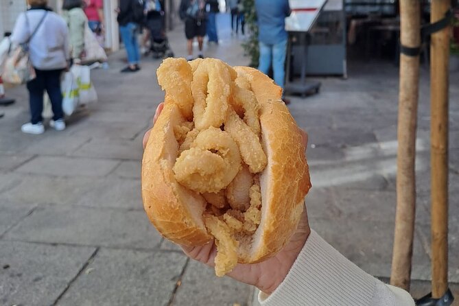 Madrid Food Tour: Tapas, Drinks and Delights with a Local - Plaza Mayor Bocadillo de Calamares: Madrid Street Food Done Right
