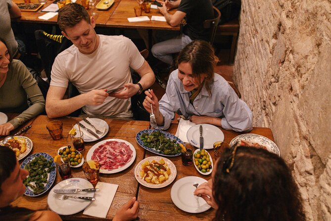 Madrid Food Walking Tour with Tapas and Vermouth - Stop 6 at Placa de la Cebada: award-winning tortilla with goat cheese + ice-cold beer