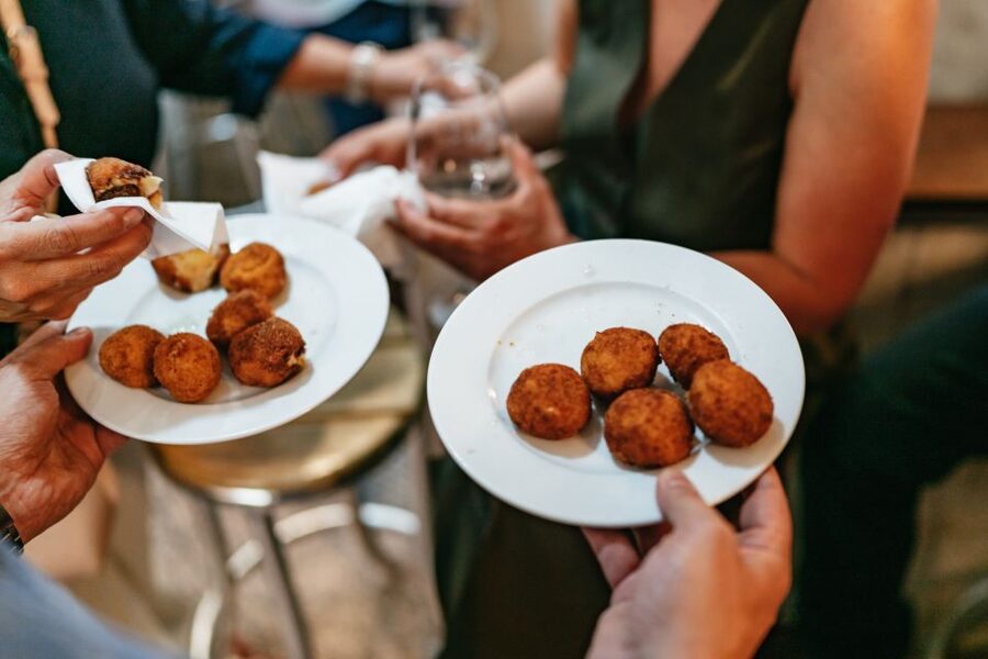 Madrid: Food & Wine Tour with 10 Tapas & 4 Drinks Included - Social vibe and walking level: an easy pace that still feels like an event