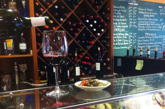 Madrid Gourmet Tapas Small Group Tour - Retiro at night, then straight into the good stuff