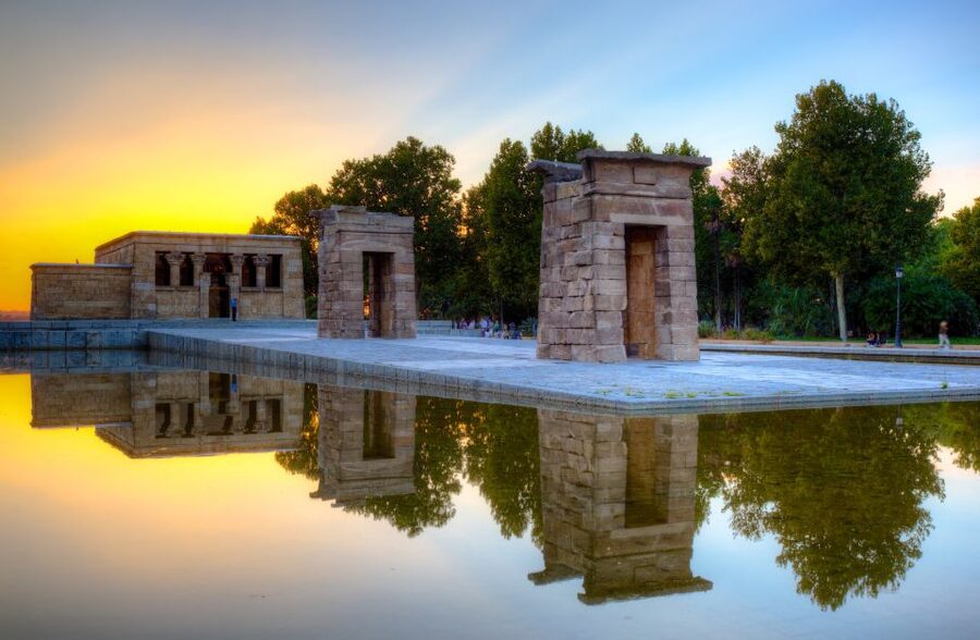 Madrid: Guided Electric Bike Tour. City center & Retiro Park - Retiro Park in 75 minutes: pond, statues, legends, and the Crystal Palace