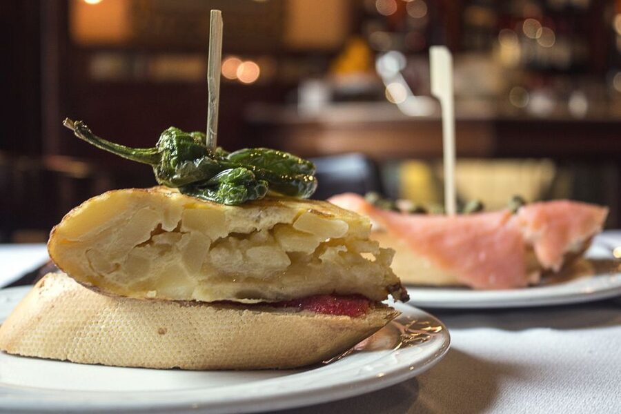 Madrid: Guided Food Tour with Authentic Tapas & Delicacies - The Star Bite: Madrid’s Deep-Fried Squid Sandwich
