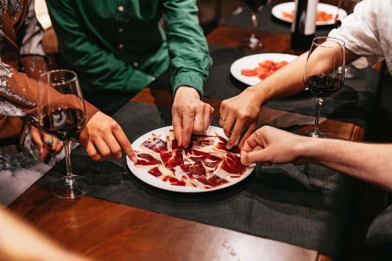 Madrid: Guided Tapas and Wine Tour with Rooftop Views - Plaza Mayor and Barrio de las Letras: history on foot, without overload