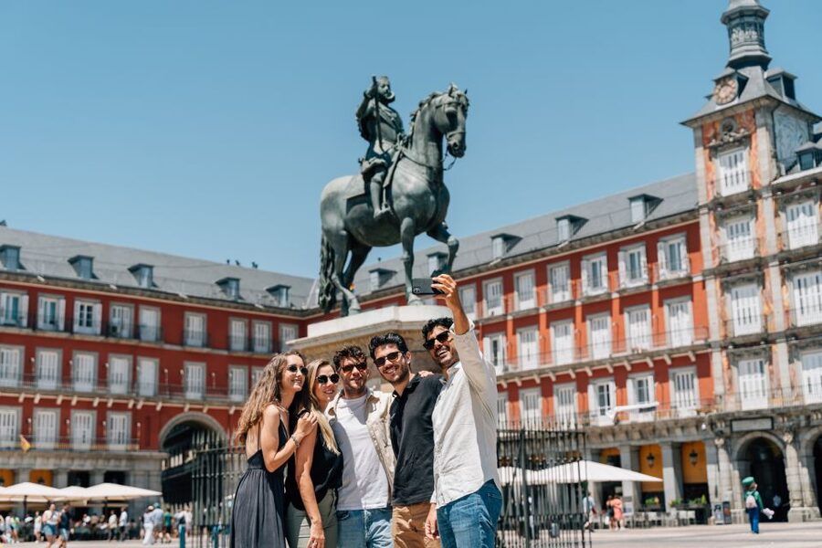 Madrid: Guided Tapas and Wine Tour with Rooftop Views - Huertas area and the old bar with carrilleras (meat cheek)