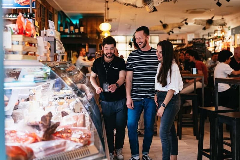 Madrid: Guided Tapas and Wine Tour with Rooftop Views - Plaza de Santa Ana and the theater terraces: Madrid’s evening mood