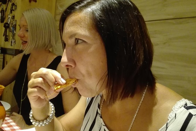 Madrid Local's Tapas Tour Dinner with a side of History - Puerta del Sol: “Time Square” vibes plus a 12-grapes tradition