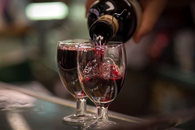Madrid Local's Wine and Tapas Lunch Tour with a side of History - La Latina on foot: medieval streets, barrio stories, and an easier sense of place