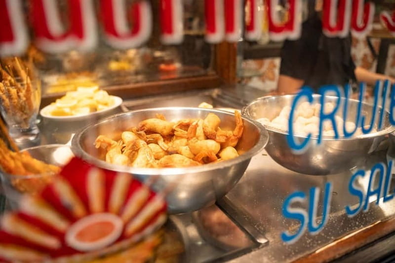 Madrid: Local Tapas, Drinks, and Hidden Gems Walking Tour - La Latina flavor lane: chorizo and Madroño make the walk feel local