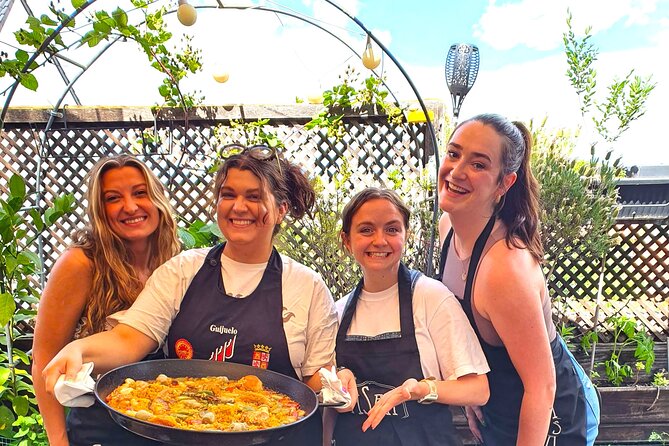 Madrid: Paella & Sangria Classes- Seafood, Chicken & Vegan option - Tapas stop: tortilla de patatas and ham toast with tomate