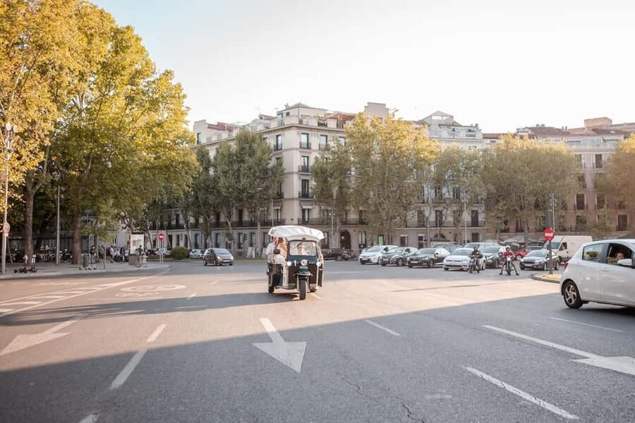 Madrid: Private City Tour by Eco Tuk Tuk - Neptune Fountain, Prado views, and the Paseo del Prado corridor