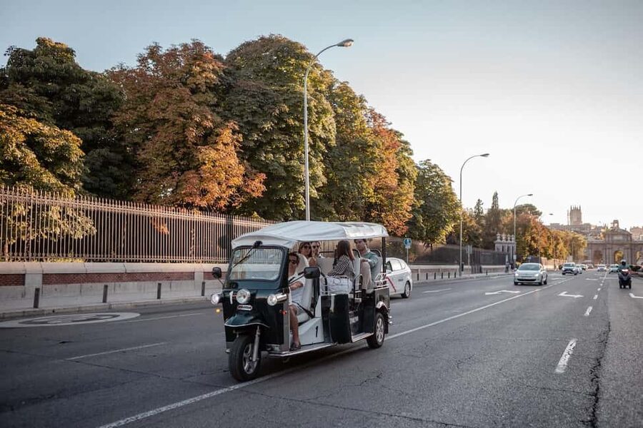 Madrid: Private City Tour by Eco Tuk Tuk - San Jerónimo el Real and the Buen Retiro approach: shifting into calmer Madrid