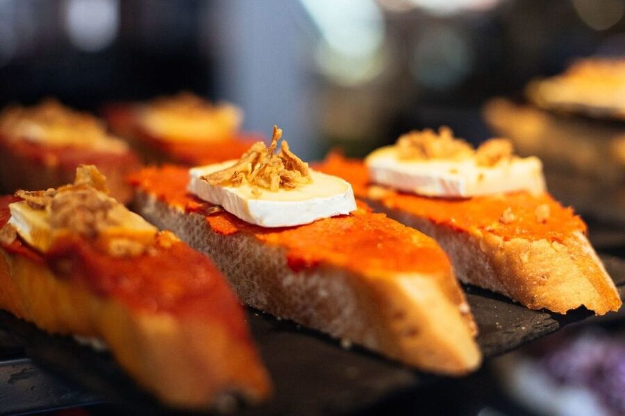 Madrid: Private Food Tour – 10 Tastings with Locals - The centerpiece classics: patata bravas and tortilla the local way