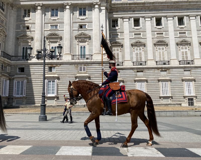 Madrid: Royal Palace Guided Shared Group Tour - The grand staircase: where you feel the palace’s power