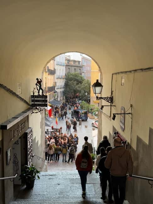 Madrid: Small Group Tour with Tapas & Drinks - Almudena Cathedral and the Royal Palace: big landmarks at a walking pace