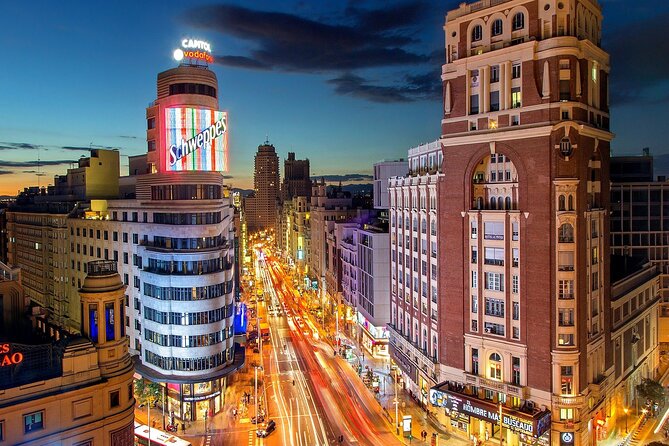 Madrid Sunset Walking Tour with Optional Flamenco Show and Dinner - Gran Via at Night: The Theater and Shops Street Comes Alive