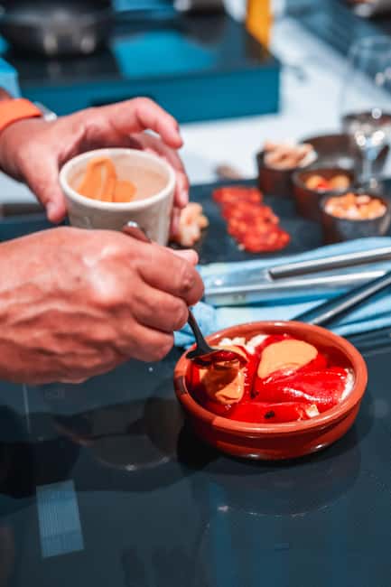Madrid: Tapas Cooking Class with bottomless Wine Pairing - Cooking Five Spanish Tapas: The Hands-On Part That Makes It Stick