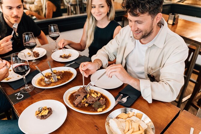 Madrid Tapas & Wine Tour with Rooftop Views and Local Guide - Stop 3: Calle de las Huertas and the carrilleras comfort course