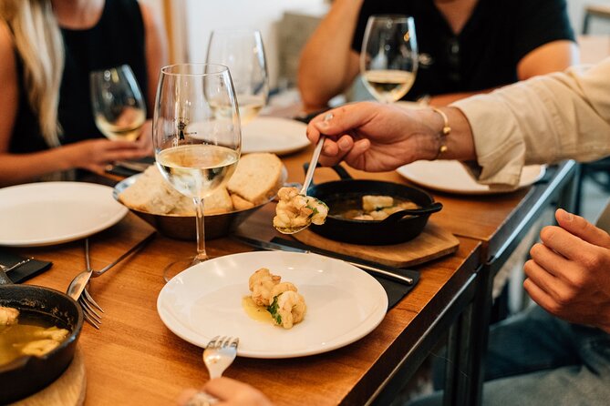 Madrid Tapas & Wine Tour with Rooftop Views and Local Guide - The rooftop finish: how the 6 PM tour turns dinner into a view