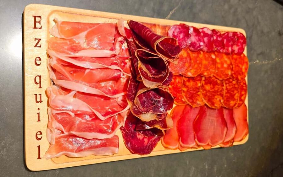 Madrid: Taste typical Spanish tapas, cold cuts, Iberian ham, and wine - Your Meet-Up Point in Malasaña (C. de Colón, 13) and What the Timing Means