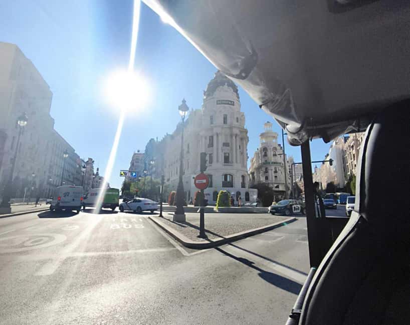 Madrid: Tour with Tuk Tuk Zero: The Best of Madrid in 2h 15min - Plaza de Santa Ana, Congress lions, and the seat of power