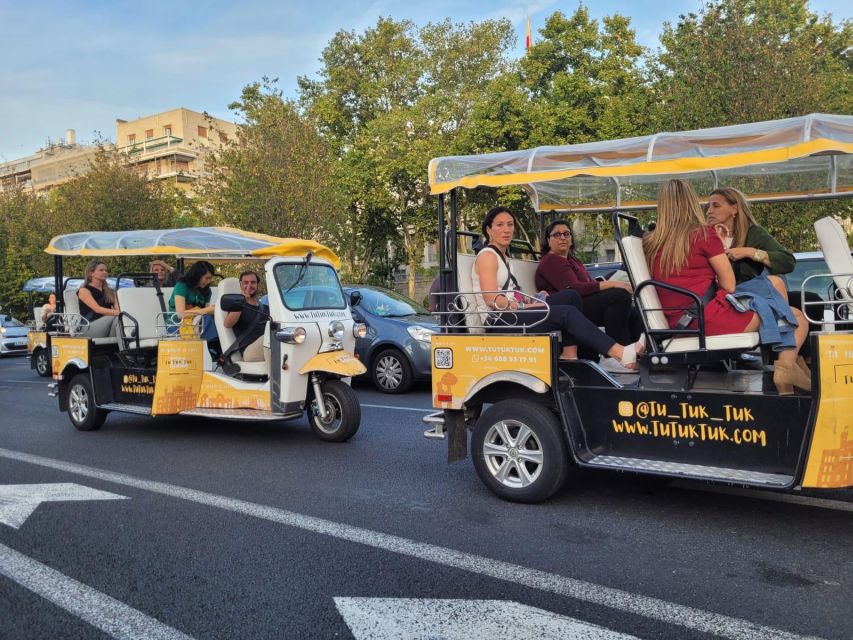 Madrid: Traditional Tour wh Private guide in yellow Tuk Tuk - Alcala Gate, Salamanca, Puerta de Alcalá, and Calle Alcalá: grand avenues and fashion-forward streets