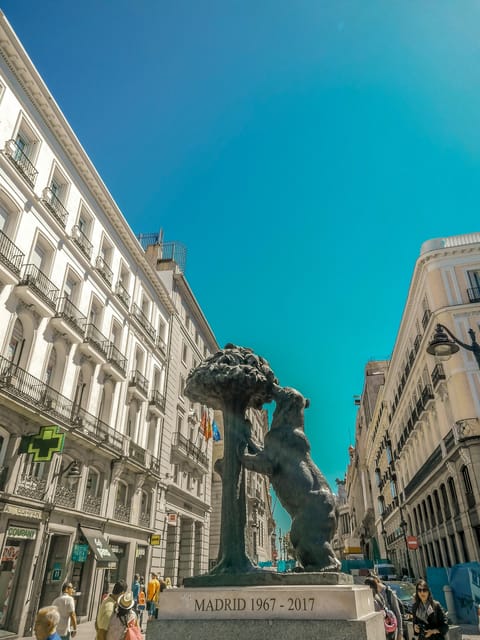Madrid: Welcome to Madrid Guided Walking Tour in English - Starting at Opera Metro and the yellow-umbrella meet-up
