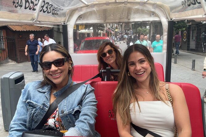 Private 1H Eco Tuk Tour in Madrid – Exclusive & Fun Experience - Biblioteca Nacional, Bank of Spain, and Gran Vía’s fast energy