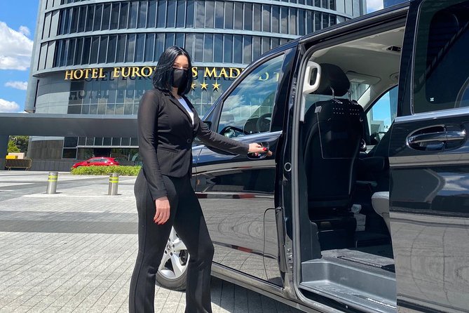 Private 4-hour City Tour of Madrid with Hotel pick-up - Puerta de Alcalá and Gran Vía: old gate meets modern Madrid energy
