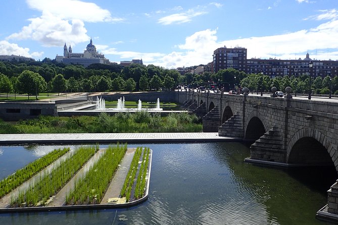 Private Madrid City Tour | Regular Bike/E-Bike | Groups from 32€ - Stop 2: Madrid landmarks, Palace and Cathedral area, and Retiro Park